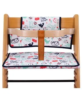 Stokke Tripp trapp - Vista frontal con retenedor Dino Party