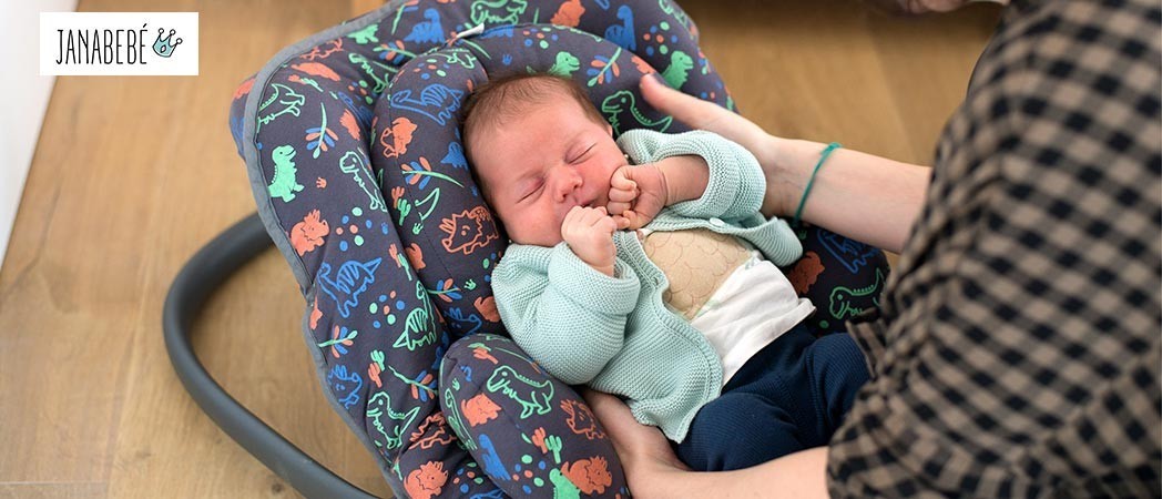 Why should you take care of your baby's back while in the car seat?